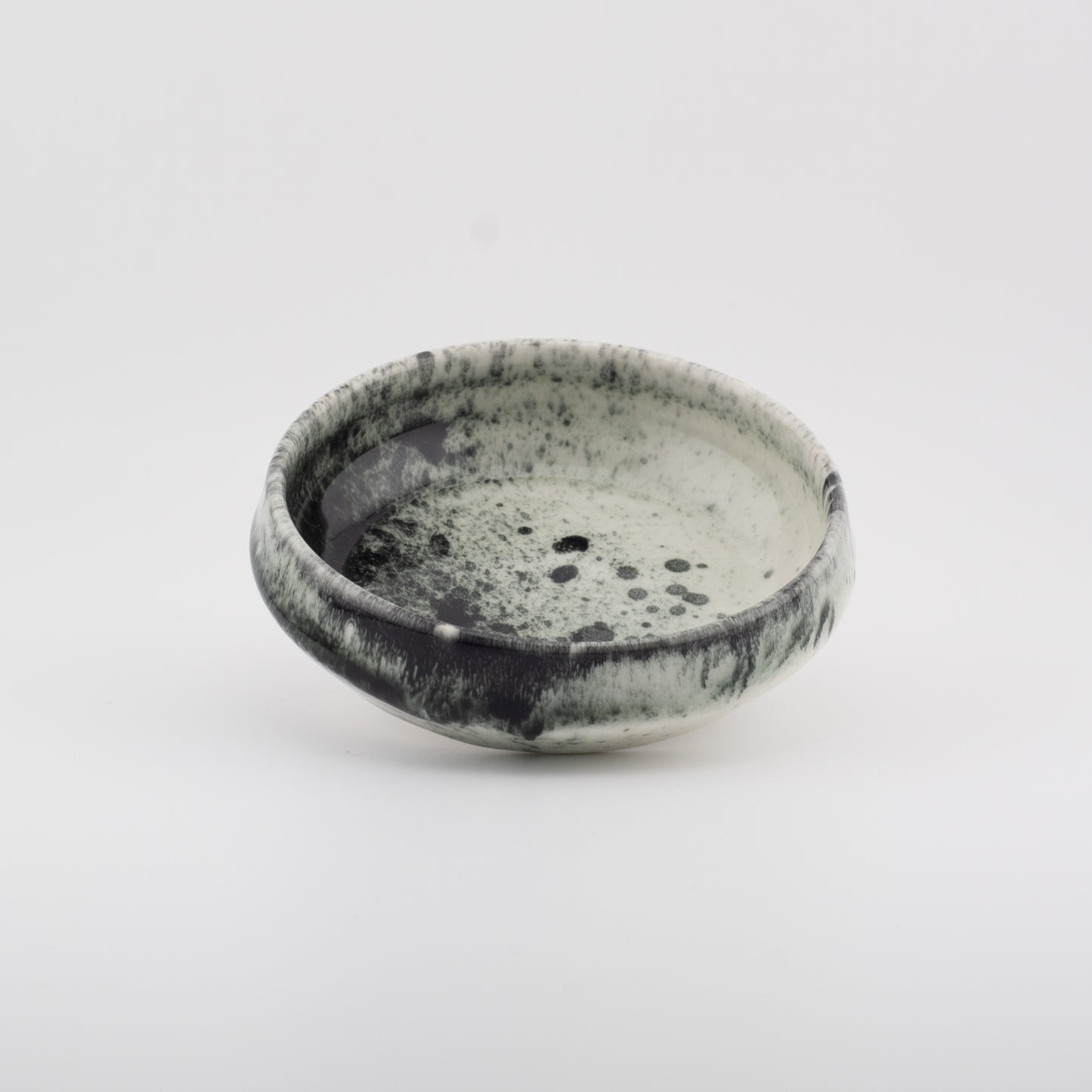 Handmade Porcelain Plates and Bowls | MK Studio | Black splash